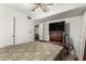 Bedroom includes a ceiling fan, a closet, and an adjacent living space at 1217 N Miller Rd # 32, Scottsdale, AZ 85257