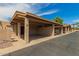 Practical carport providing sheltered parking with unit number 32 clearly marked at 1217 N Miller Rd # 32, Scottsdale, AZ 85257