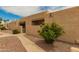 Charming condo exterior with private patio and desert landscaping in a gated entry at 1217 N Miller Rd # 32, Scottsdale, AZ 85257