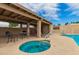 A community hot tub and pool provide an area for relaxation at 1217 N Miller Rd # 32, Scottsdale, AZ 85257