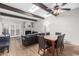 The spacious living room is enhanced by hardwood floors, a fireplace and large windows with natural light at 1217 N Miller Rd # 32, Scottsdale, AZ 85257