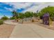 Inviting entrance to Vista del Camino Park with manicured landscape, walking path, and community signage at 1217 N Miller Rd # 32, Scottsdale, AZ 85257