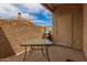 Outdoor patio area featuring a glass table and a grill, perfect for outdoor dining at 1217 N Miller Rd # 32, Scottsdale, AZ 85257
