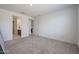 Spacious bedroom with plush carpeting, neutral walls, and ample natural light at 12316 W Wagon Wheel Dr, Glendale, AZ 85307