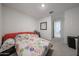 Bedroom with carpet and view into the hallway at 12316 W Wagon Wheel Dr, Glendale, AZ 85307