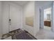 Entryway with tile flooring and views of a bathroom and hallway at 12316 W Wagon Wheel Dr, Glendale, AZ 85307