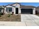 Charming single-story home with a two-car garage and low maintenance landscaping at 12316 W Wagon Wheel Dr, Glendale, AZ 85307