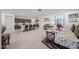 Open-concept kitchen and dining area with stainless steel appliances and tile floors at 12316 W Wagon Wheel Dr, Glendale, AZ 85307