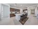Kitchen island with barstool seating, stainless steel appliances and granite countertops at 12316 W Wagon Wheel Dr, Glendale, AZ 85307