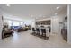 Bright, open floor plan with a kitchen island and a spacious living area with lots of natural light at 12316 W Wagon Wheel Dr, Glendale, AZ 85307