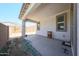 Covered patio with concrete slab flooring and view to the backyard at 12316 W Wagon Wheel Dr, Glendale, AZ 85307