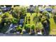 Aerial perspective of a lush, well-maintained backyard and mature trees, complemented by a manicured lawn at 125 N Fraser E Dr, Mesa, AZ 85203