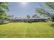 Expansive backyard offers ample space for outdoor living at 125 N Fraser E Dr, Mesa, AZ 85203