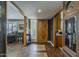 Beautiful hallway with patterned wood floors leading to the living room at 125 N Fraser E Dr, Mesa, AZ 85203