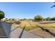 Expansive community park featuring green space, walking paths, and manicured landscaping at 14556 W Shaw Butte Dr, Surprise, AZ 85379