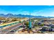 Aerial view of the waterfront with monument and picturesque mountains in background at 15212 N 53Rd St, Scottsdale, AZ 85254