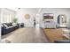 Open concept living room with tiled floors and ample space for entertaining, combining style and functionality at 15212 N 53Rd St, Scottsdale, AZ 85254