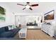 Spacious living room with a comfortable sectional sofa and open layout that is perfect for relaxing and entertaining at 15212 N 53Rd St, Scottsdale, AZ 85254