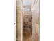 Walk-in shower featuring decorative tile, a showerhead and a window for added light at 15212 N 53Rd St, Scottsdale, AZ 85254