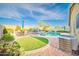 Beautiful inground swimming pool, mature landscaping, and backyard patio space at 17225 N 51St Dr, Glendale, AZ 85308