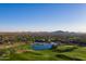 Aerial view of a sprawling golf course community with lush greenery and scenic landscapes at 1788 W Dion Dr, Anthem, AZ 85086