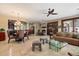 Spacious living area merges with dining area, complemented by a modern design and comfortable seating at 1788 W Dion Dr, Anthem, AZ 85086