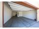 Spacious two-car garage offering ample parking and storage with automatic door at 17947 W Jojoba Rd, Goodyear, AZ 85338