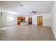 Open-concept kitchen featuring granite countertops, stainless appliances, and ample cabinet space at 17947 W Jojoba Rd, Goodyear, AZ 85338