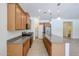 Well-equipped kitchen features stainless steel appliances and granite countertops at 17947 W Jojoba Rd, Goodyear, AZ 85338