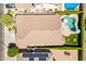 Aerial shot of the property showcasing the backyard pool and patio area at 18003 W Carmen Dr, Surprise, AZ 85388