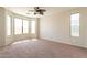 Spacious bedroom with carpet and neutral walls, offering a serene and relaxing atmosphere at 18003 W Carmen Dr, Surprise, AZ 85388