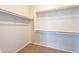 Walk-in closet with ample shelving and storage space at 18003 W Carmen Dr, Surprise, AZ 85388