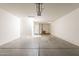 Spacious garage with ample room for parking and storage at 18003 W Carmen Dr, Surprise, AZ 85388