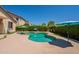 Private backyard pool with mature landscaping and plenty of patio space at 18003 W Carmen Dr, Surprise, AZ 85388