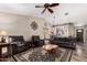 Inviting living room with vaulted ceilings, stylish decor, and comfortable seating at 18016 N 145Th Ave, Surprise, AZ 85374