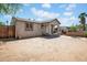 View of the home's exterior showing the yard's potential and the home's easy access at 1815 E Illini St, Phoenix, AZ 85040