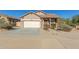 Beautiful single Gathering home showcasing a two-car garage, desert landscaping, and modern design at 18414 W La Mirada Dr, Goodyear, AZ 85338