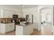 Well-equipped kitchen features granite countertops and modern appliances for convenient cooking at 18414 W La Mirada Dr, Goodyear, AZ 85338