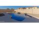 Beautifully designed backyard pool with desert landscaping, offering a private oasis at 18414 W La Mirada Dr, Goodyear, AZ 85338
