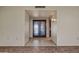 Foyer featuring a tiled floor and double doors with decorative glass panels at 19053 N Lakeforest Dr, Sun City, AZ 85373
