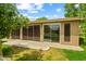 Enclosed back patio with sliding glass doors, perfect for enjoying the outdoors year-round at 19053 N Lakeforest Dr, Sun City, AZ 85373