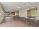 Sunroom featuring tile floors and sliding glass doors to the outside at 19053 N Lakeforest Dr, Sun City, AZ 85373