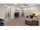 Spacious living room featuring recessed lighting, neutral color palette, and comfortable seating at 1906 N 140Th Dr, Goodyear, AZ 85395