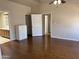Spacious main bedroom with hardwood flooring and access to both the bathroom and walk-in closet at 201 S Greenfield S Rd # 222, Mesa, AZ 85206
