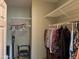 Walk-in closet featuring wire shelving, hanging rods, and ample space for clothing storage at 20376 N Coronado Way, Surprise, AZ 85374