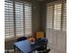 Well-lit dining area featuring plantation shutters and modern decor, perfect for intimate meals at 20376 N Coronado Way, Surprise, AZ 85374