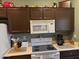 Kitchen with appliances, ample counter space, and stylish cabinets at 20376 N Coronado Way, Surprise, AZ 85374