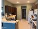 Spacious kitchen with modern appliances, wooden cabinets, and functional layout at 20376 N Coronado Way, Surprise, AZ 85374