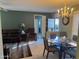 Open concept living and dining areas with stylish furnishings, tile flooring, and natural light at 20376 N Coronado Way, Surprise, AZ 85374
