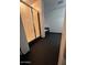 Bathroom showcasing a glass shower and bathtub against dark flooring at 21570 N Greenway Rd, Maricopa, AZ 85138